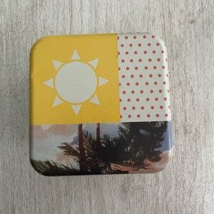 Fossil Pink Tin with Rabbit Design